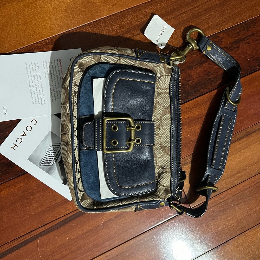 Coach hobo bag. Vintage style. Beautiful blue suede and leather buckle front .
